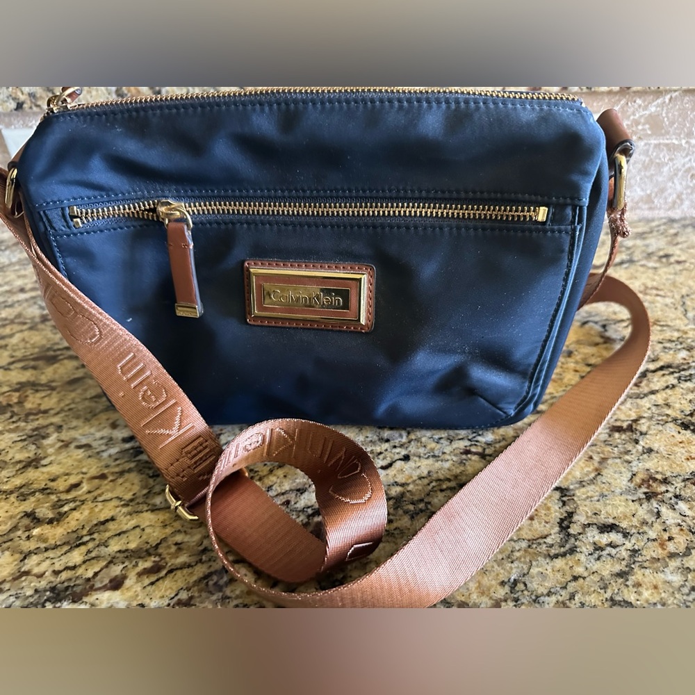 Calvin Klein Navy Crossbody with Brown Logo Strap
